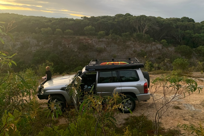 Four wheel drive wagon in outback terrain