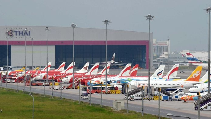 Aircraft line up on the tarmac at Bangkok's Suvarnabhumi international airport
