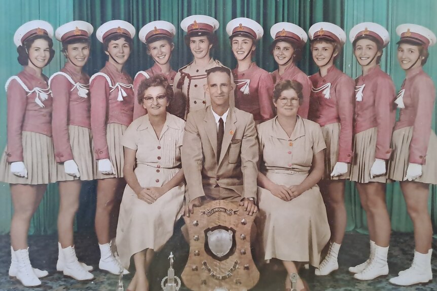 An historic photo of marching girls.