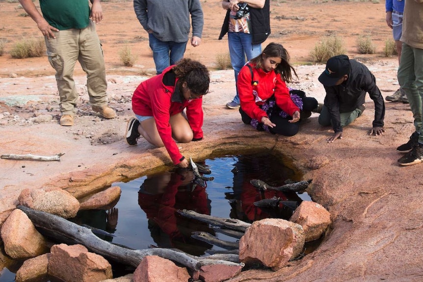 Children at rock holes