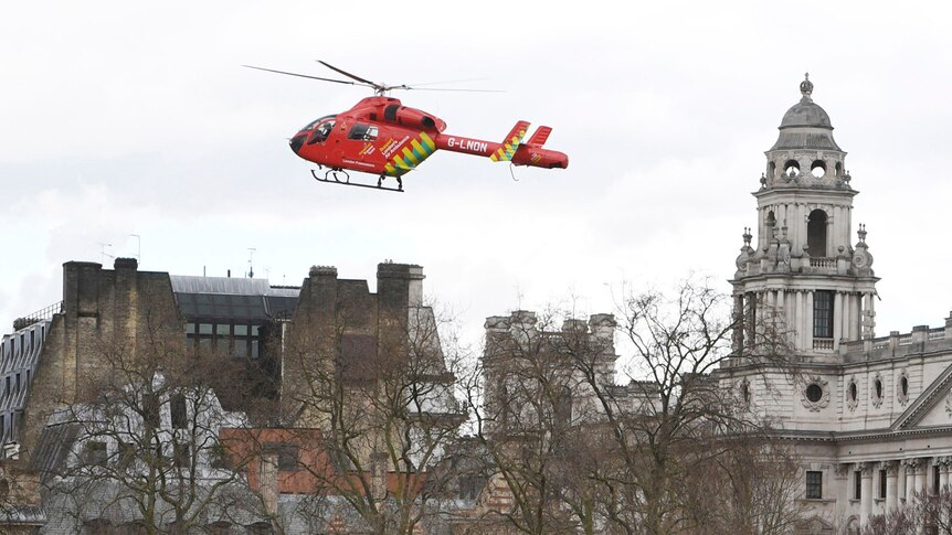 An air ambulance hovers above the ground after the London terrorist attack on March 22, 2017