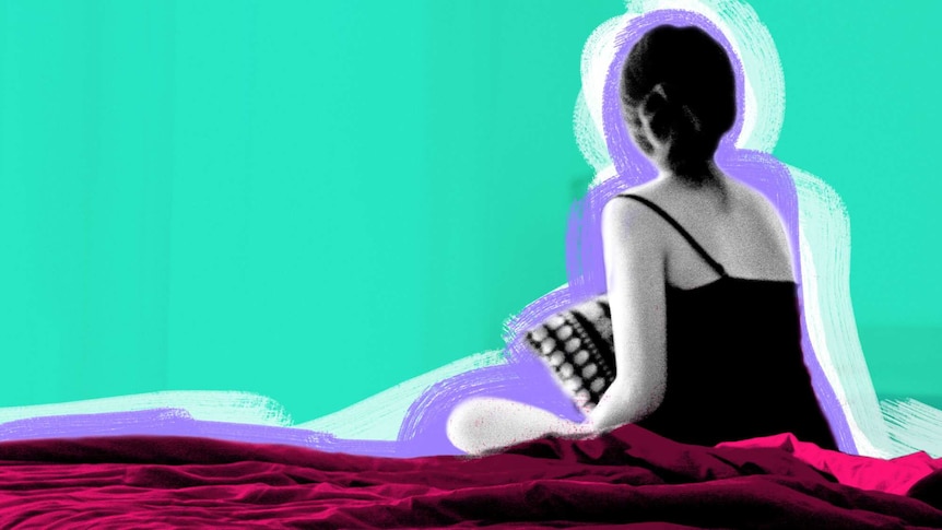 Illustration shows woman sitting on bed with back turned for a story about why the silent treatment is harmful in relationships.