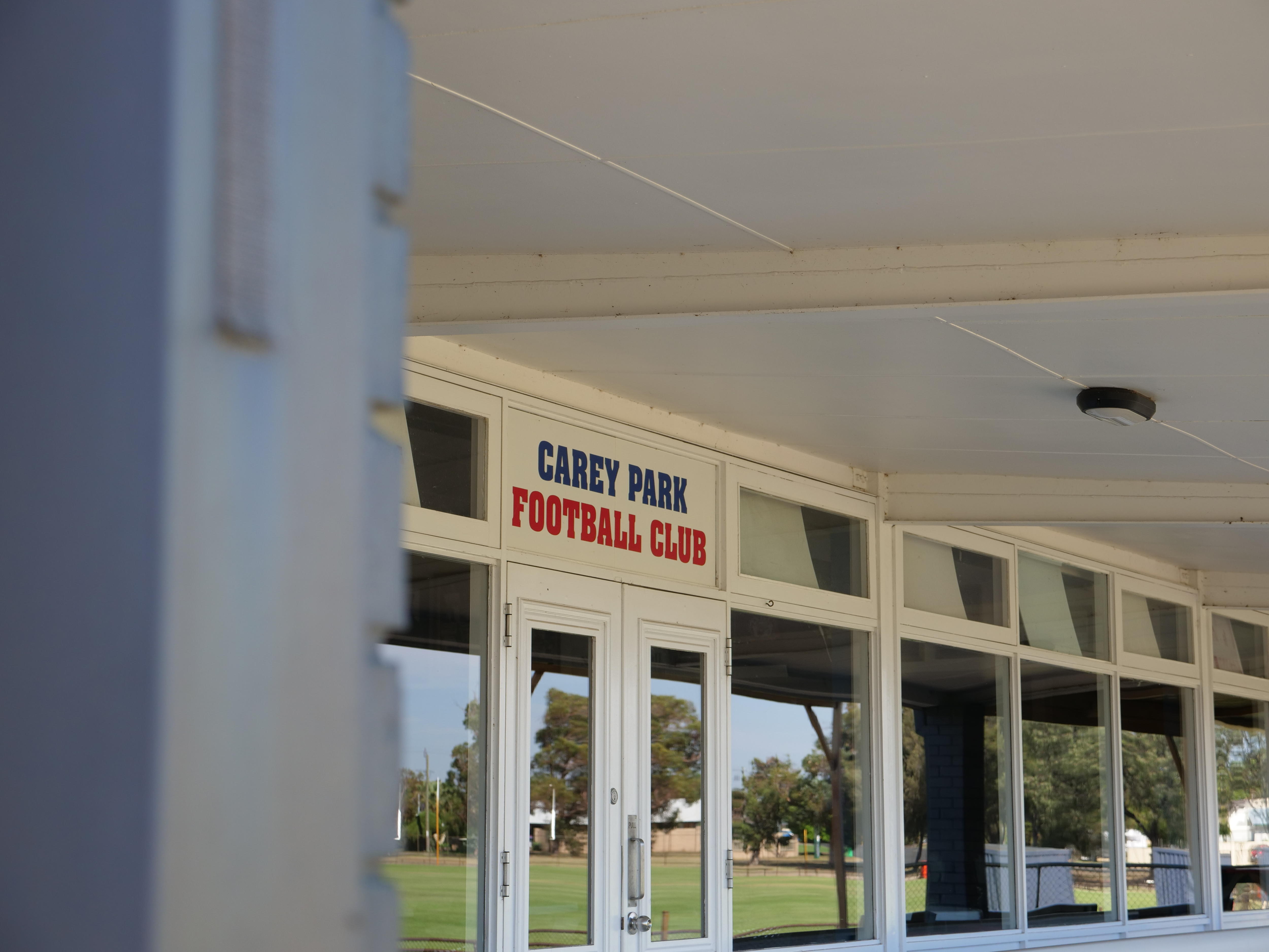 Football club sign above door