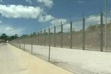 Christmas Island detention centre with photo of wire