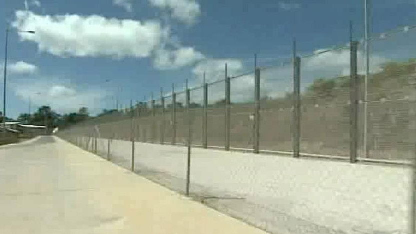 Christmas Island detention centre with photo of wire