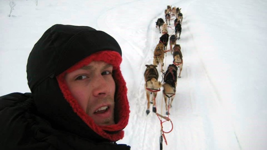 Christian Turner and his dogs during the Iditarod race.