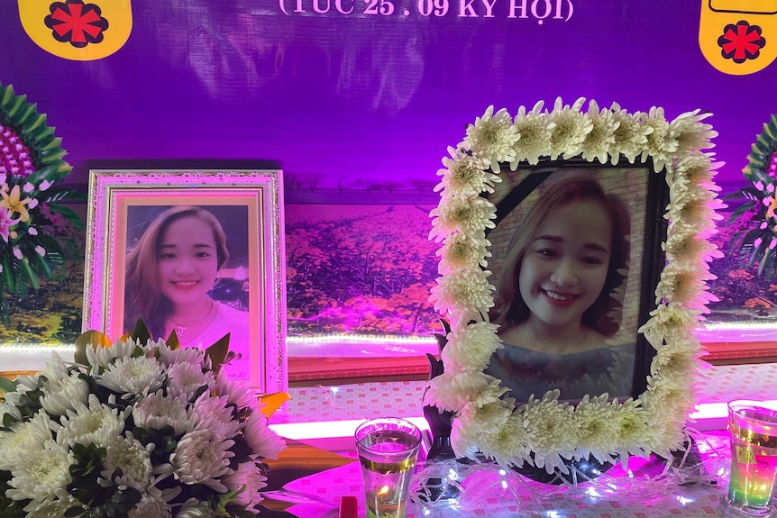 Portraits of Bui Thi Nhung are displayed in a shrine put up at the family home.