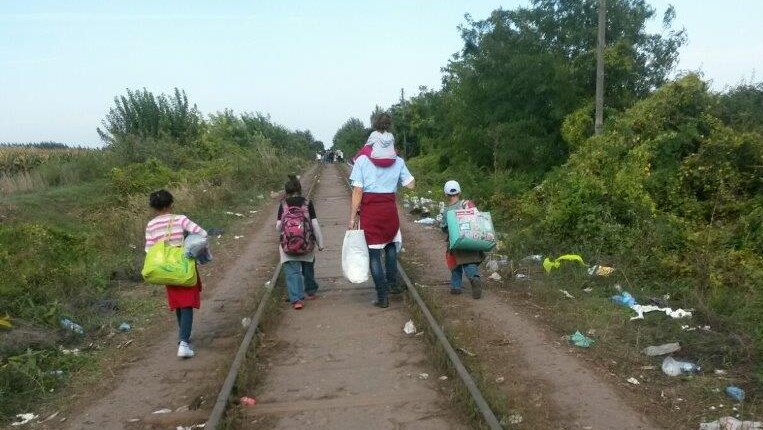 The Hafi family walking along traintracks through Hungary to Austria in September 2015