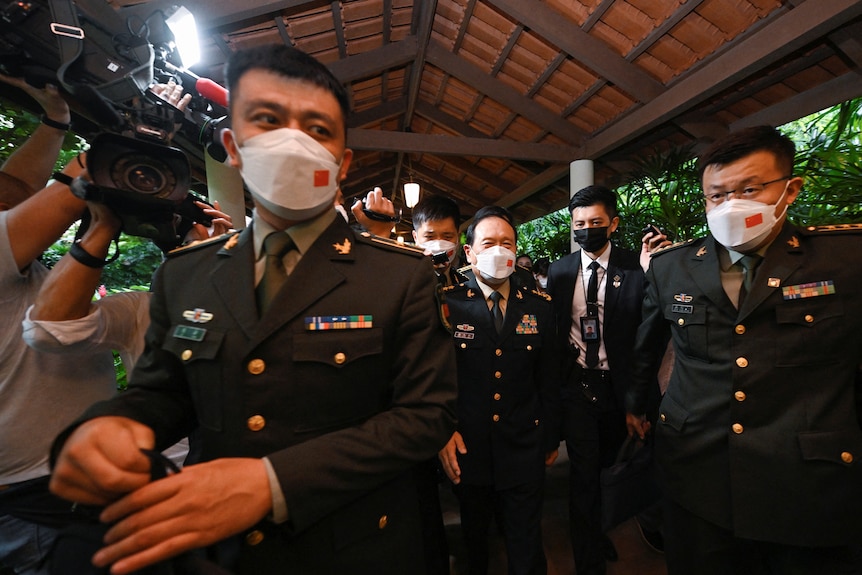 China's State Councilor and Defence Minister General Wei Fenghe leaving after a meeting.