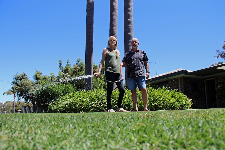 Anne and John Dimov love their lawn