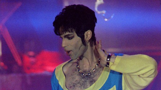 The musician Prince performing onstage during the World Music Awards ceremony in Monaco