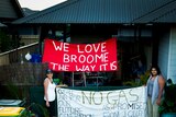 Broome residents with anti gas hub signs.