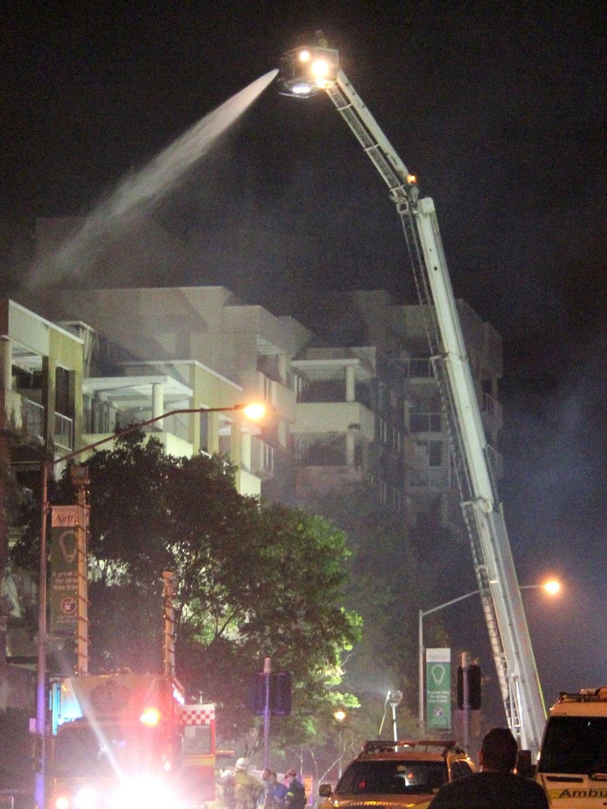 Water crane tackles Cathedral Place unit complex fire