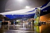 A planeload of passengers disembarking an aircraft