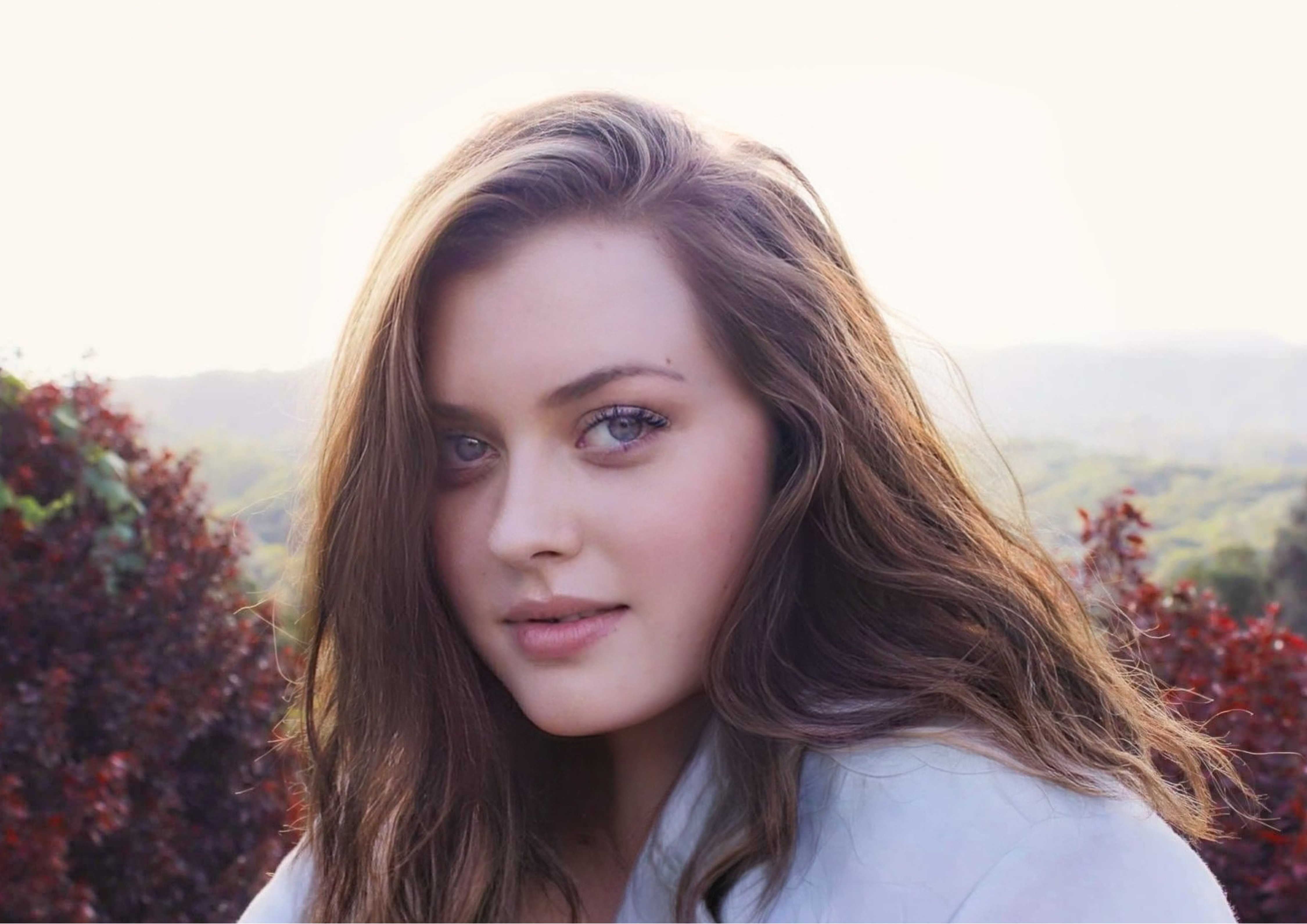 Christina Fern, a pretty woman with long brown hair, striking eyes