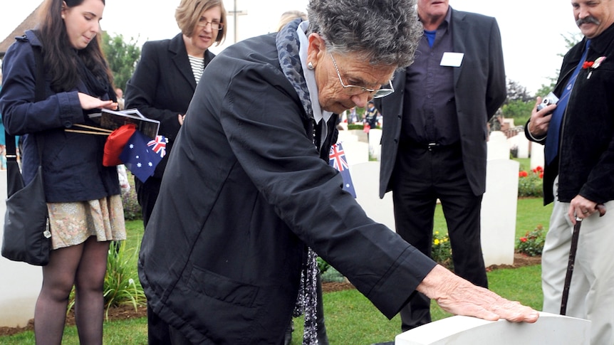 Australian relatives pay their respect in a ceremony to honour 14 newly identified WWI soldiers.