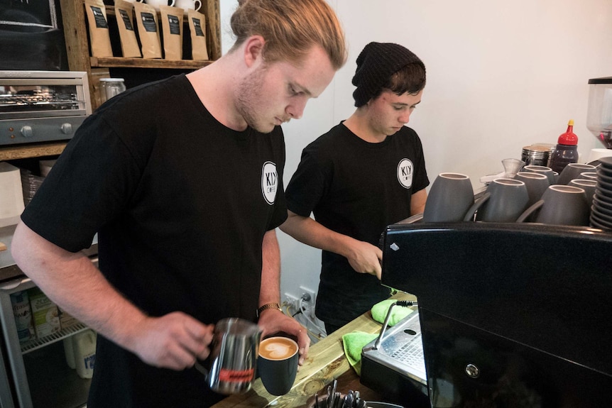 Barrister trainer Matthew Hojem with KIK Coffee employee Lachlan Broekx.