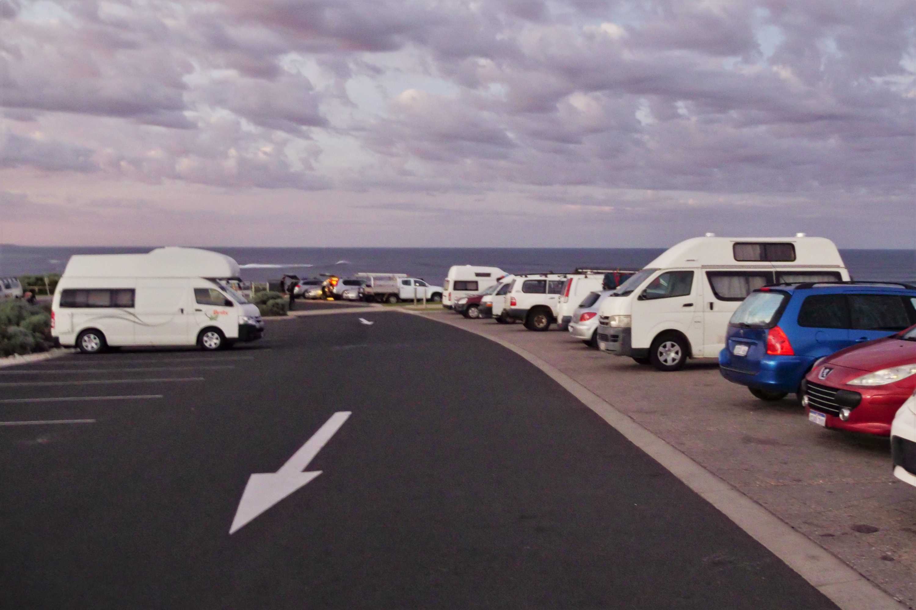 A line of cars in the Surfers Point carpark in Margaret River.