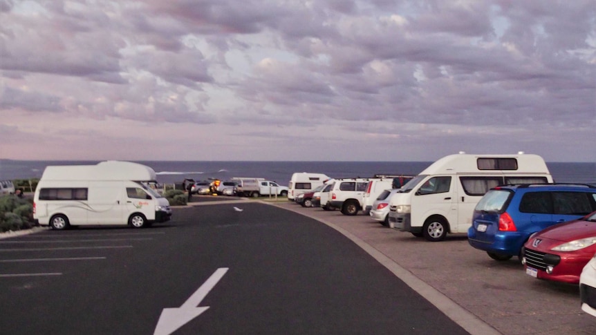 A line of cars in the Surfers Point carpark in Margaret River.