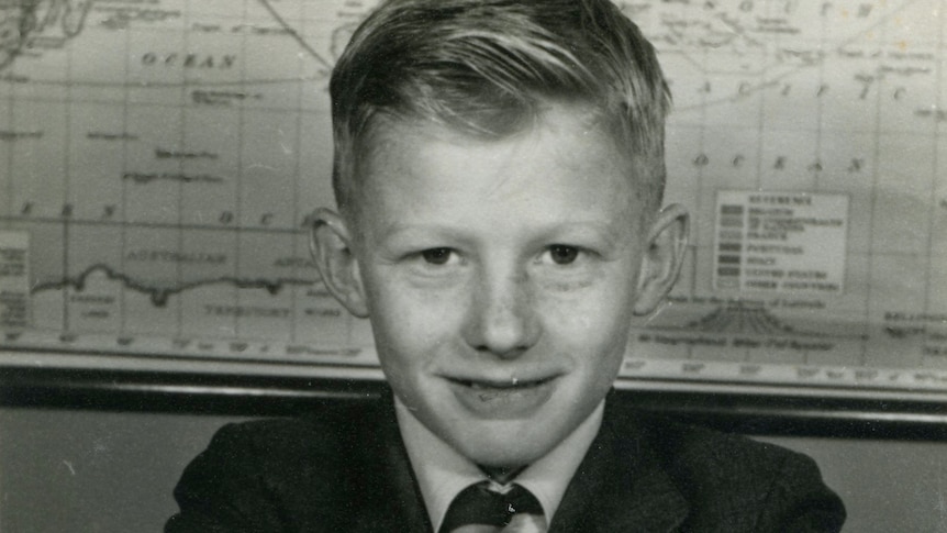 A black-and-white school photo of a young boy, circa 1958.