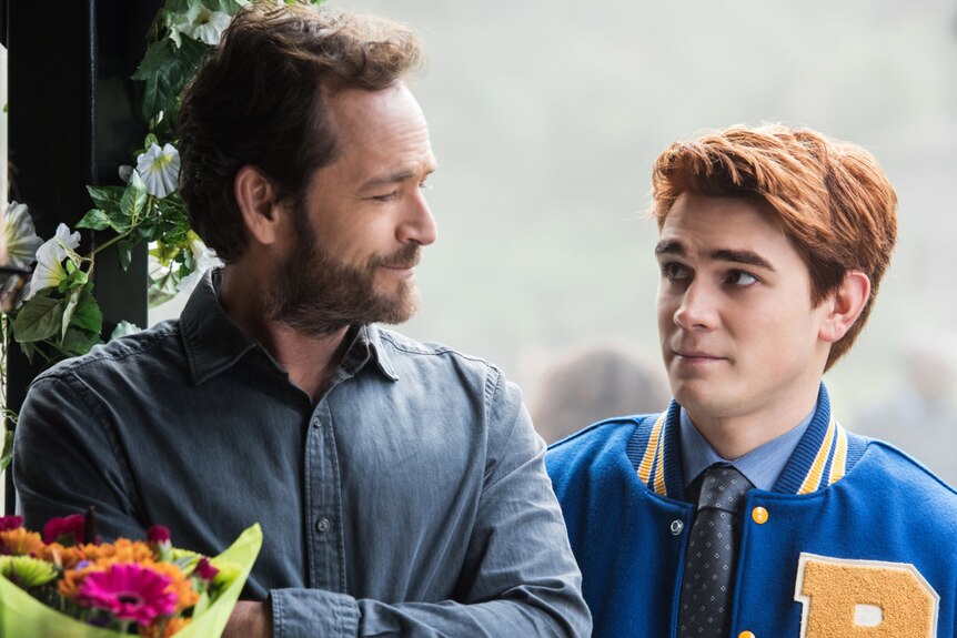 Luke Perry, left, with Riverdale co-star KJ Apa, who plays the role of Archie Andrews.