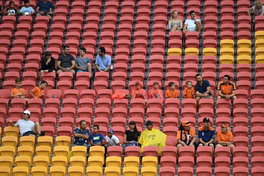 A sparsely occupied section of crowd at Lang Park for the Roar v Jets