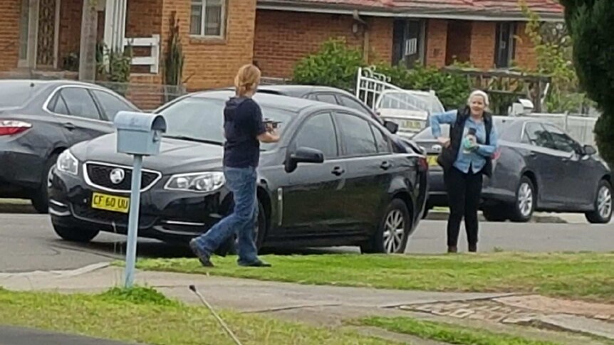 Australian Federal Police officers raiding a Heckenberg house, in south western Sydney.