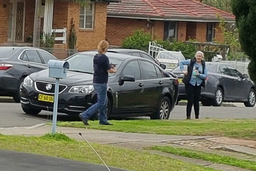 Australian Federal Police officers raiding a Heckenberg house, in south western Sydney.