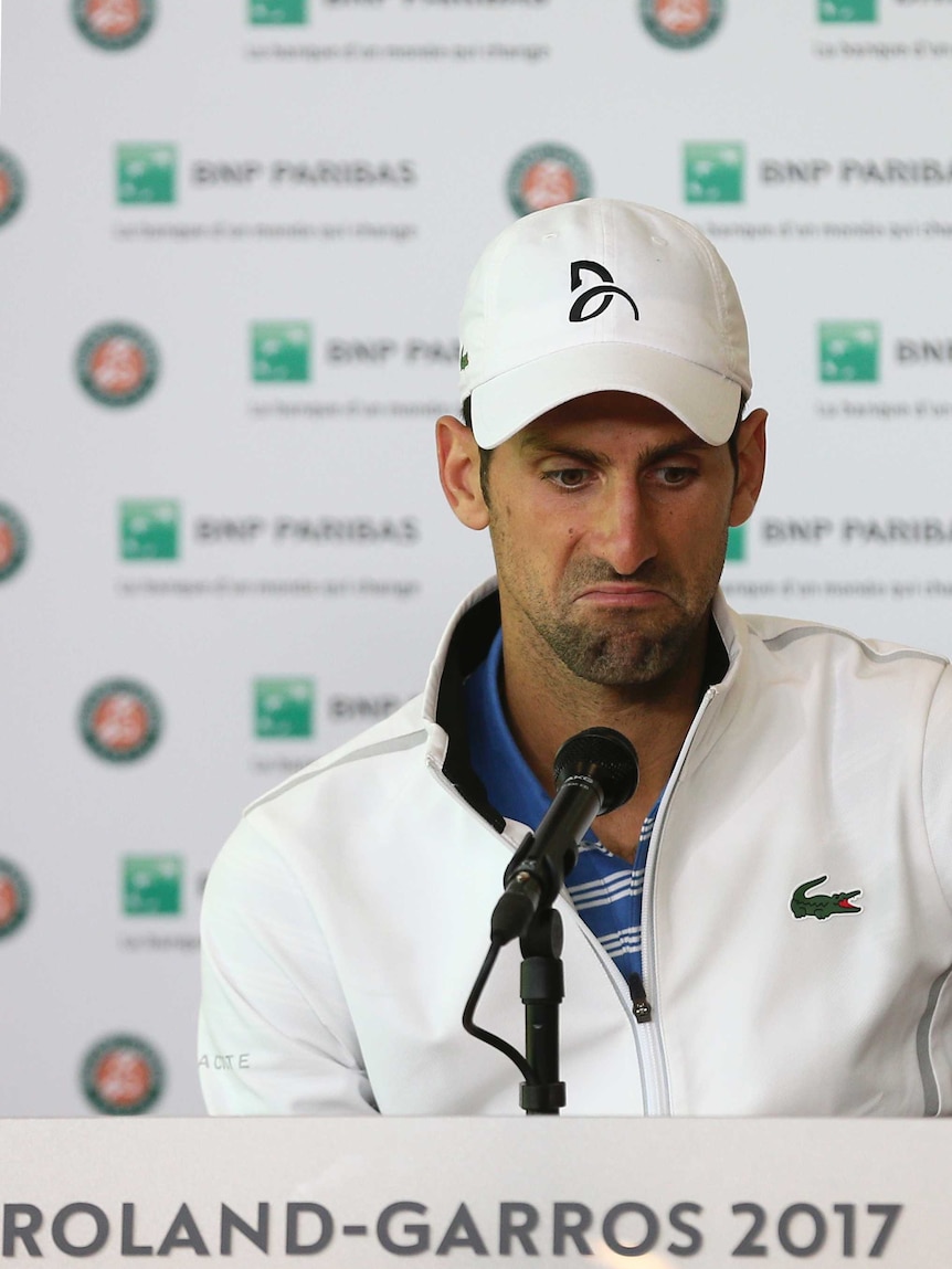 Novak Djokovic looks miserable after being knocked out of French Open