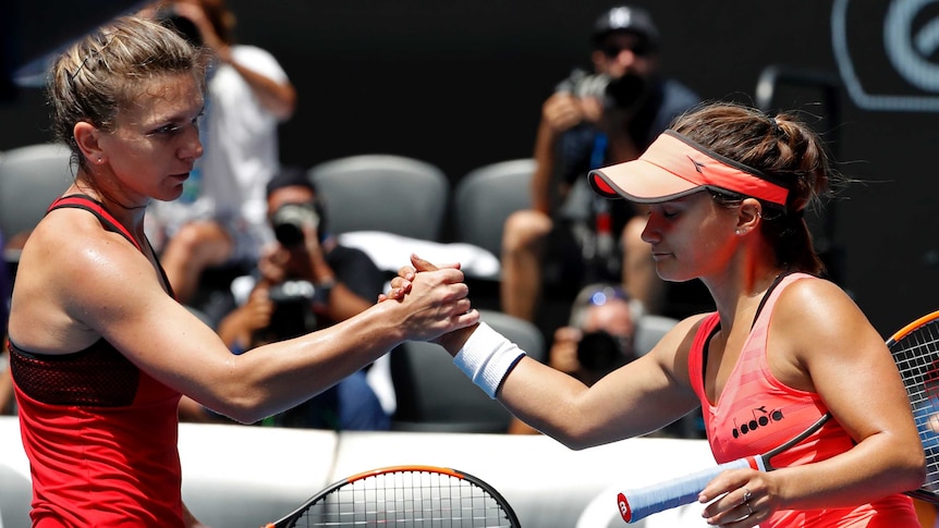 Simona Halep shakes hands with Lauren Davis after their third-round Australian Open match.