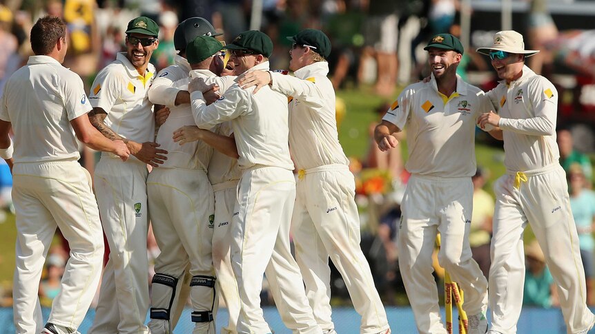 Australia celebrates final wicket in first Test