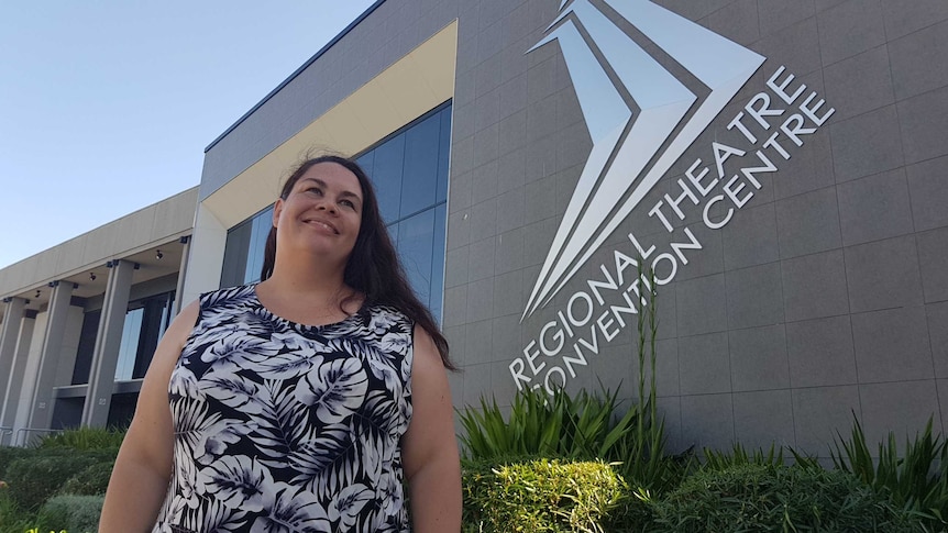 Dubbo woman in front of regional theatre