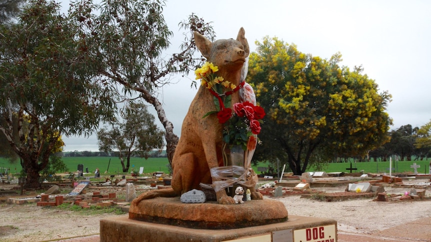A stone dog cenotaph stands at the front of Corrigin Dog Cemetery