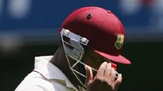 Brian Lara leaves the field after being dismissed on day four of Gabba Test