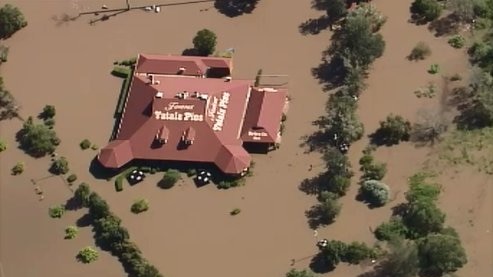 Yatala's famous pie shop has been totally inundated, it is less than a kilometre from the Albert River.