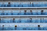 Crew on board the Ruby Princess as the cruise liner docks at Port Kembla, Wollongong, Monday, April 6, 2020.