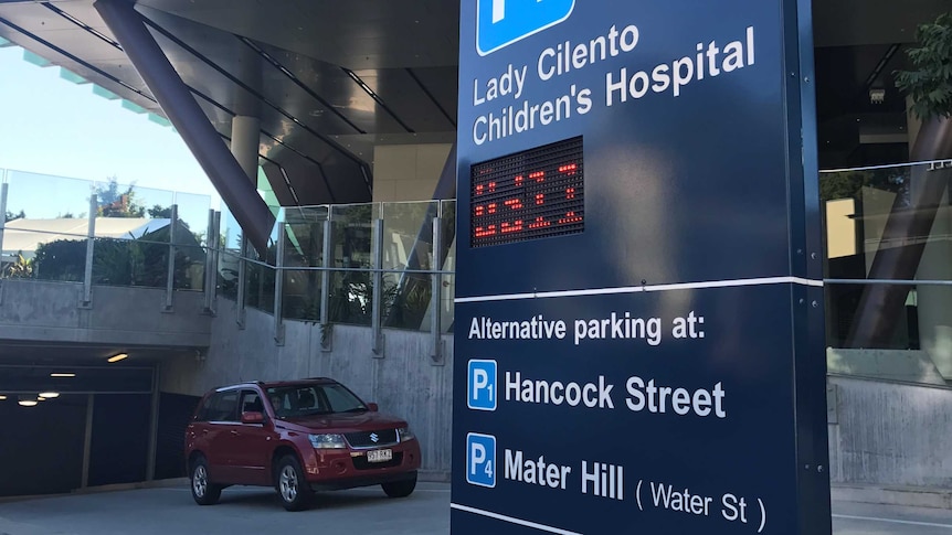 The entrance way to an underground carpark at a modern hospital.