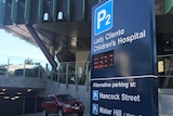 The entrance way to an underground carpark at a modern hospital.