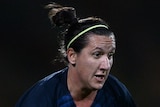 An Australian female footballer player with the ball during an international against China in Portugal.