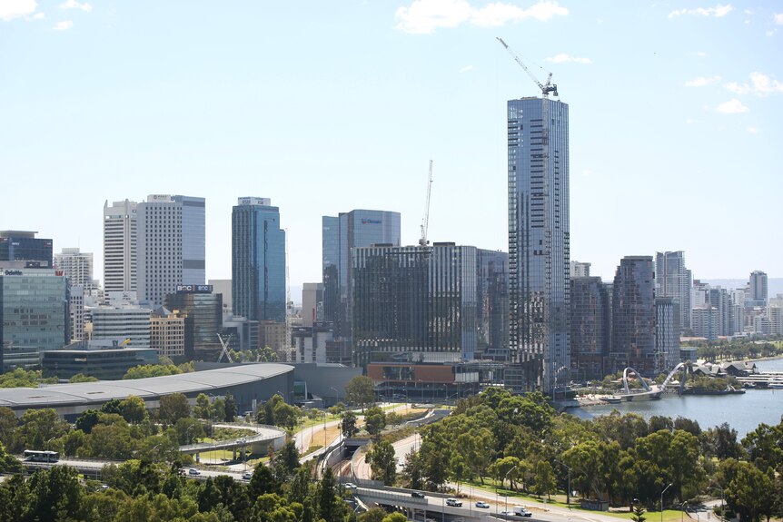 A photo of the Perth waterfront in broad daylight, with many skyscrapers in frame.