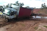 truck rolled over in mud