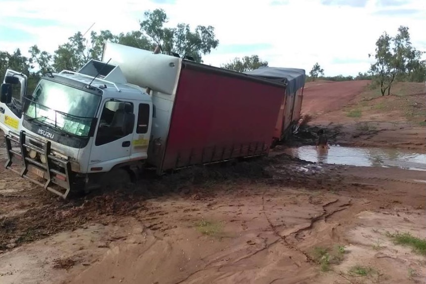 truck rolled over in mud