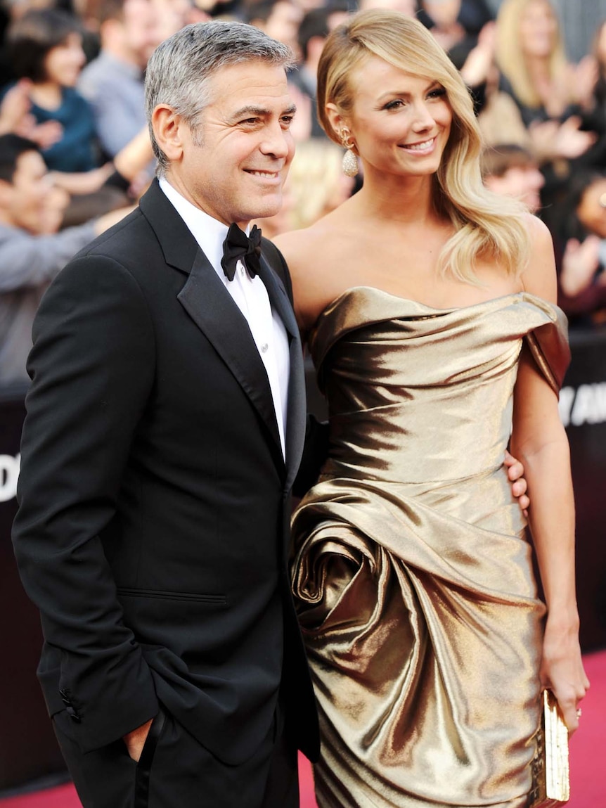 George Clooney and Stacy Kiebler arrive at the 84th annual Academy Awards