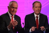 Malcolm Turnbull and Bill Shorten gesture during the Leaders' Debate.
