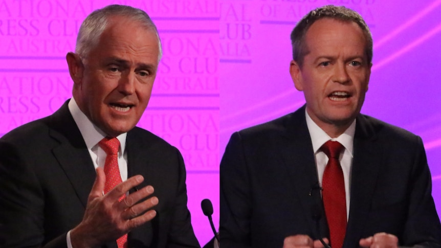 Malcolm Turnbull and Bill Shorten gesture during the Leaders' Debate.