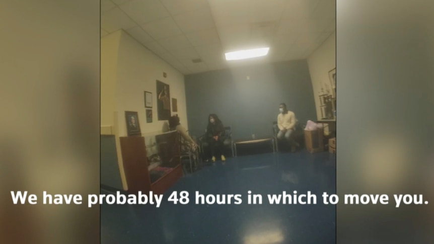 A image from a bodycam shows a meeting between three people where one says: "We probably have 48 hours in which to move you."
