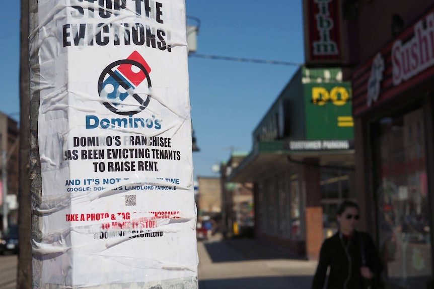 A sign that reads 'stop the evictions' on a Parkdale street