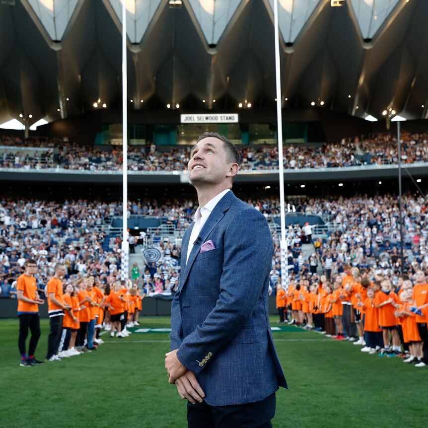 Joel Selwood looks up on Kardinia Park in front of the Joel Selwood Stand