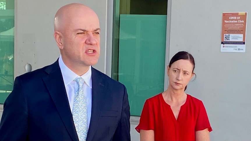 Queensland Chief Health Officer John Gerrard and Health Minister Yvette D'Ath at a press conference on COVID-19