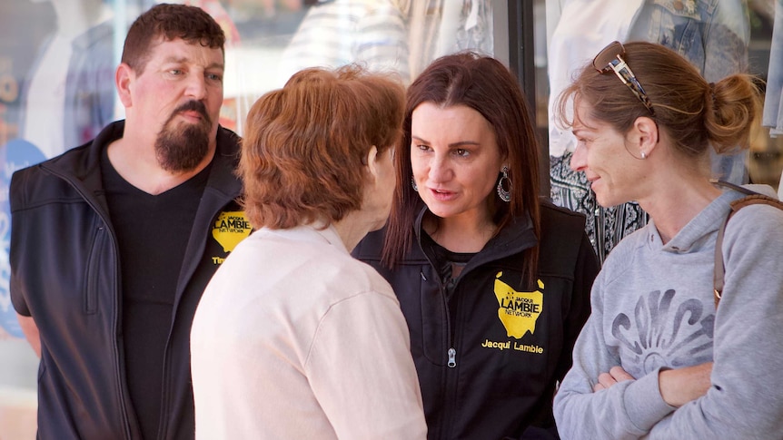 Jacqui Lambie chats to people on the street.